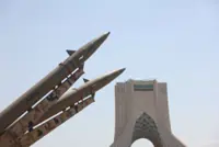 Exclusive-Iran warns Gulf states: tell Trump to desist or we hit you hard