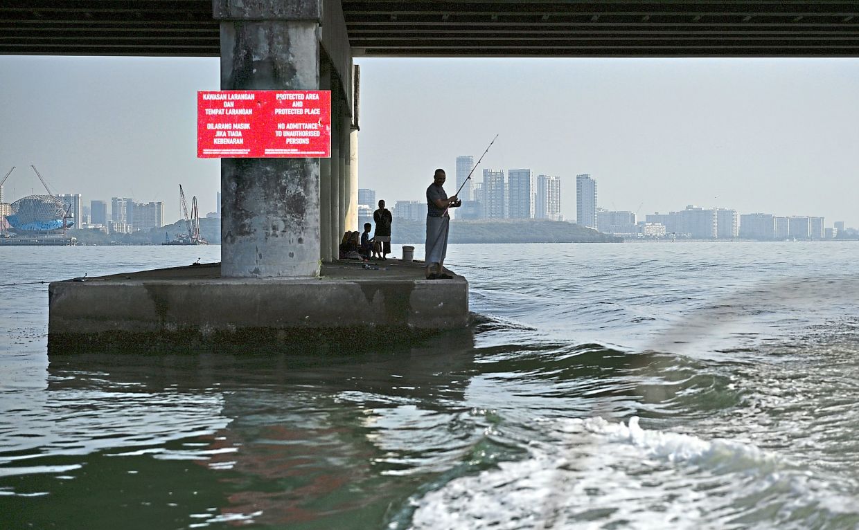 Three anglers detained for fishing beneath Penang bridge