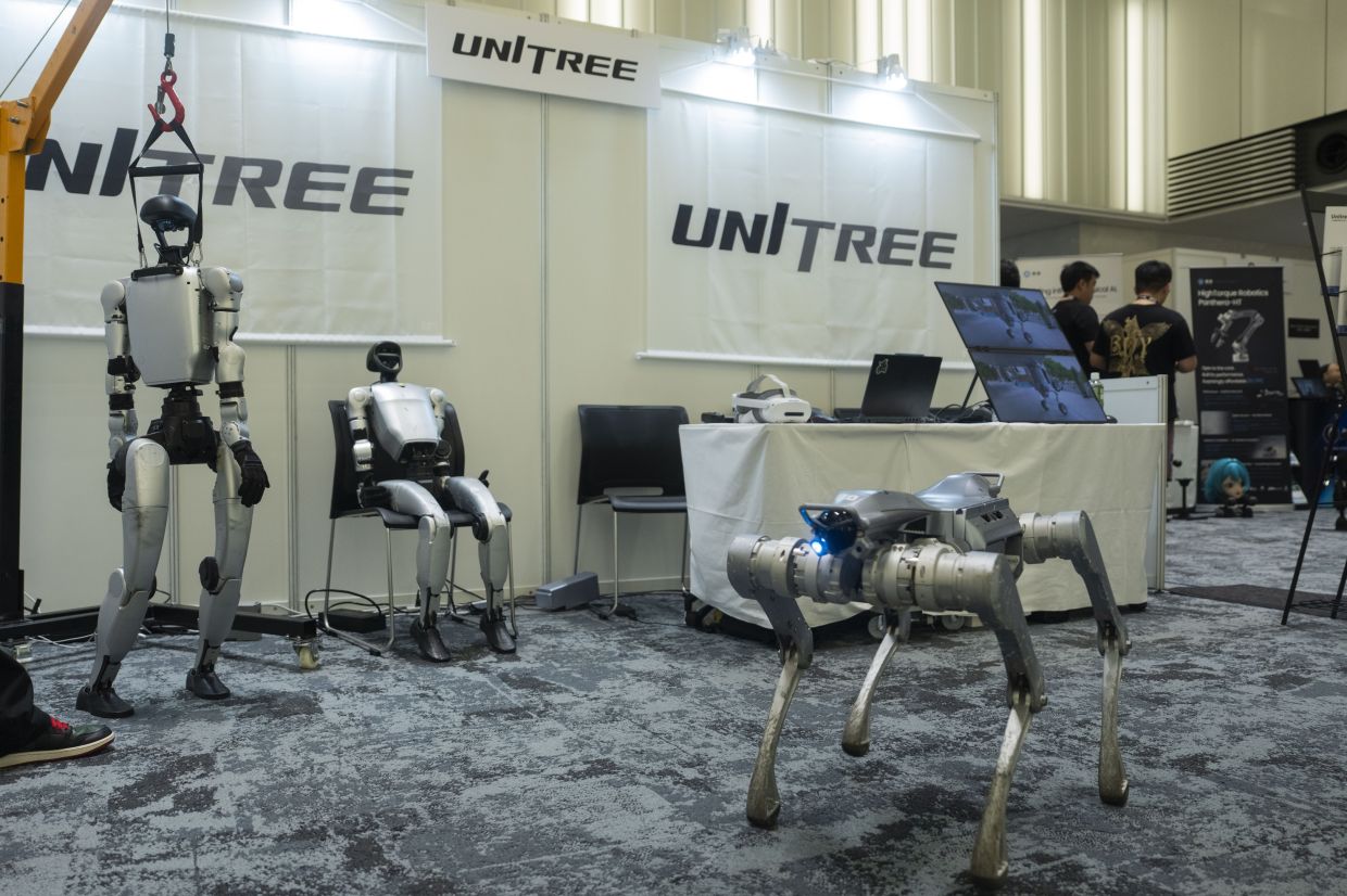 China's robots know kung fu and can scale walls. Can they woo investors?