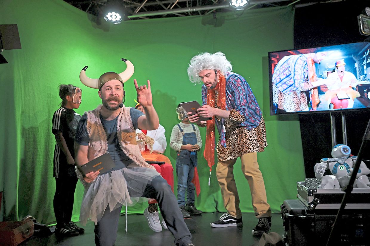 Show director Boyd Branch (left) and Alex Newson perform during 'How To Train Your Robot' at Gilded Balloon at Edinburgh Fringe 2025. Photo: Reuters 