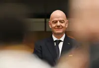 Soccer-Infantino finds a friend in Africa as CAF backs FIFA president