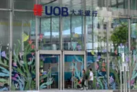 Singapore banks ride Asia's wealth boom to weather rates headwind