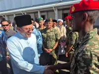 Govt to expedite promotions for Armed Forces, police, says Anwar