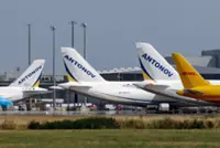 Bus driver kicked explosive drone out of the air at German airport, lawmaker says