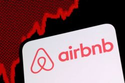 Airbnb hits four-year high as investors cheer revenue forecast raise, AI payoff