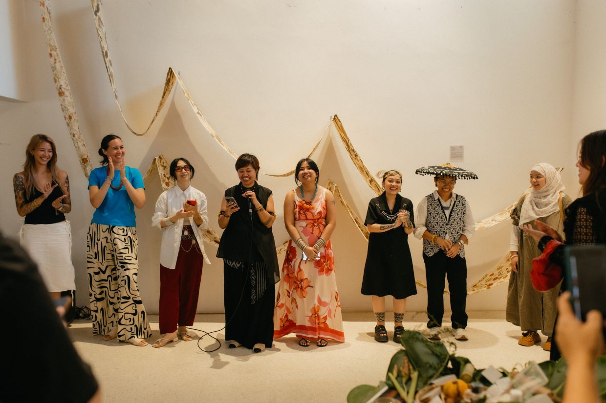 Part of the 'Ancestors Of The Future' exhibition line-up at Temu House are (from left) Hannah Bhatt, Alena Murang, Saerah R. Kunjan, Sarah Lois Dorai, Allie Jabing, Bethany Luhong Balan, Loretta Livan Milang and Ayue Juman. Photo: Yaeber Neo