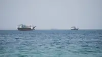 Iran says deal on the Strait of Hormuz is close but will not open the waterway by itself, although normal oil traffic to resume