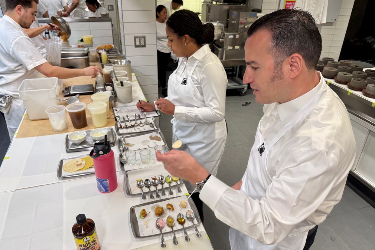 Chef Val Cantu, co-owner of Californios, samples the tasting menu at the restaurant in San Francisco.