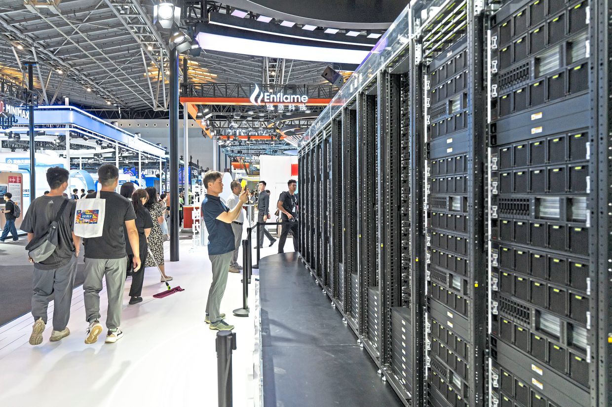 A life-size display of Huawei Ascend Atlas 900 A3 SuperPod, which is built to train and run large-scale AI models, on display at a the World Artificial Intelligence Conference in Shanghai last month. — Photos: QILAI SHEN/The New York Times