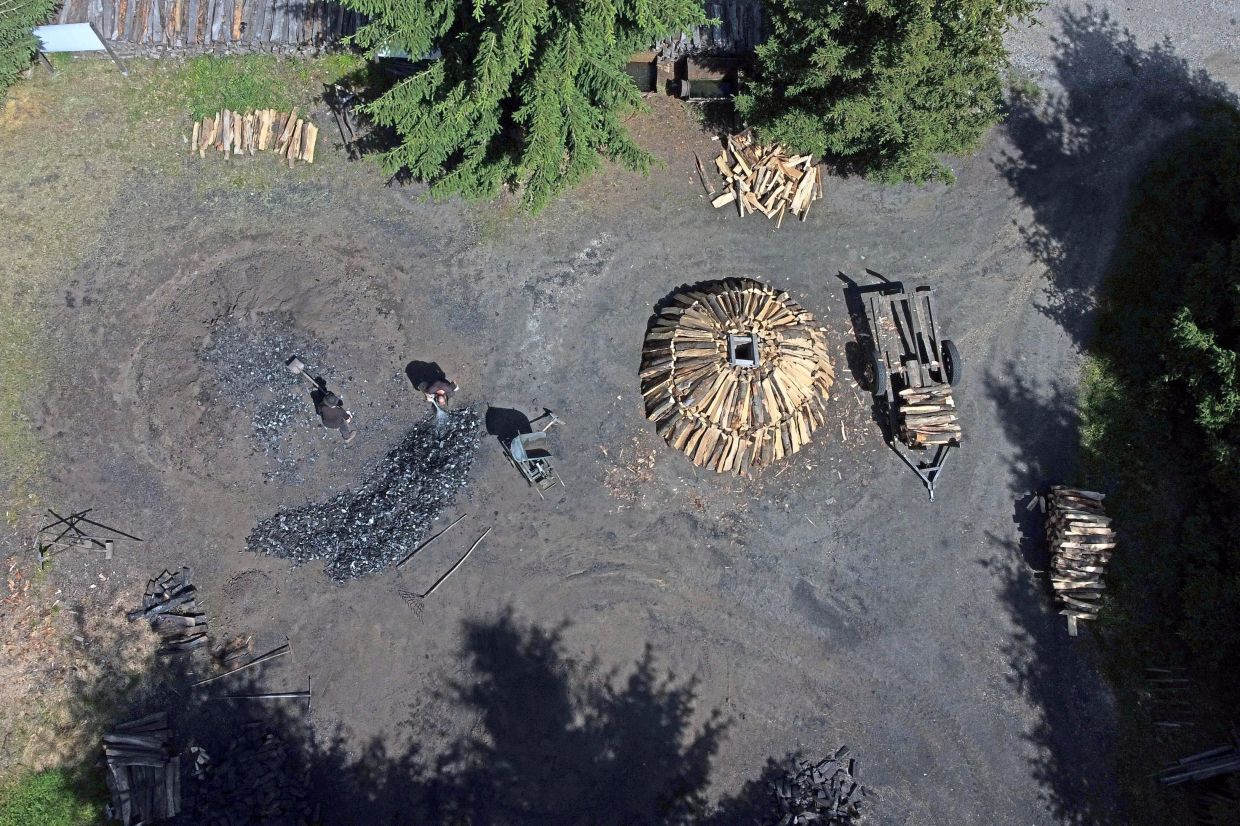 An overview of the Feldmers' charcoal production site.