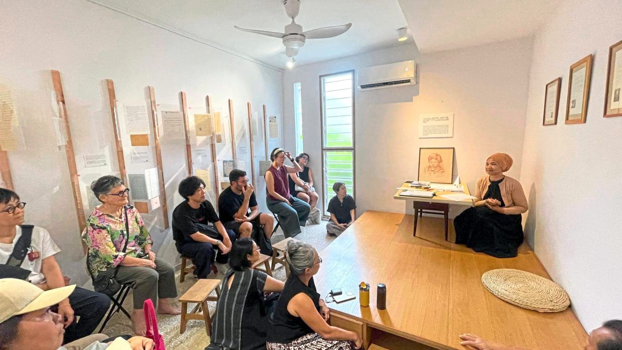 Art gallery director Nazura Rahime (right) hosted 'Dear Mama', a gathering on Aug 2 that brought together readings, art, music and home-style snacks to explore her correspondence and enduring connection with her late mother. Photo: Papan Haus