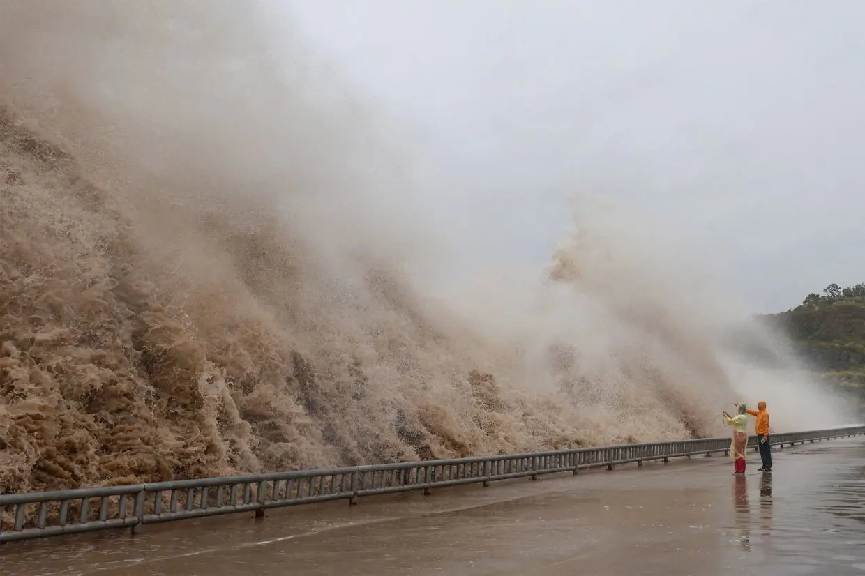 Typhoon Dolphin approaches eastern China, forcing closures and mass evacuations; thousands left without power in Okinawa