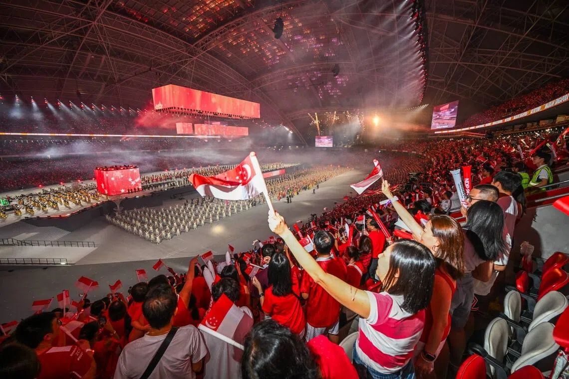 Some 45,000 people buzzed with excitement as they celebrated the Singapore’s 61st birthday celebrations. - Photo: ST