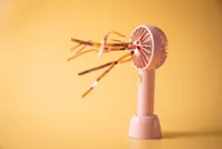 Too hot to sleep at night? A fan can help, but there are pros and cons