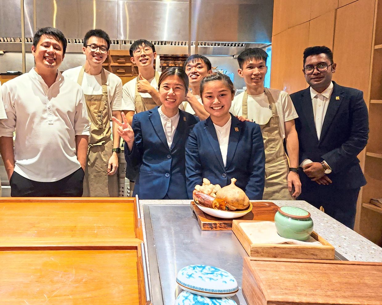 Wong (above, extreme left) has pledged to donate 1% of the proceeds from all four of his Penang restaurants to regenerative farming projects in Malaysia. — Filepic
