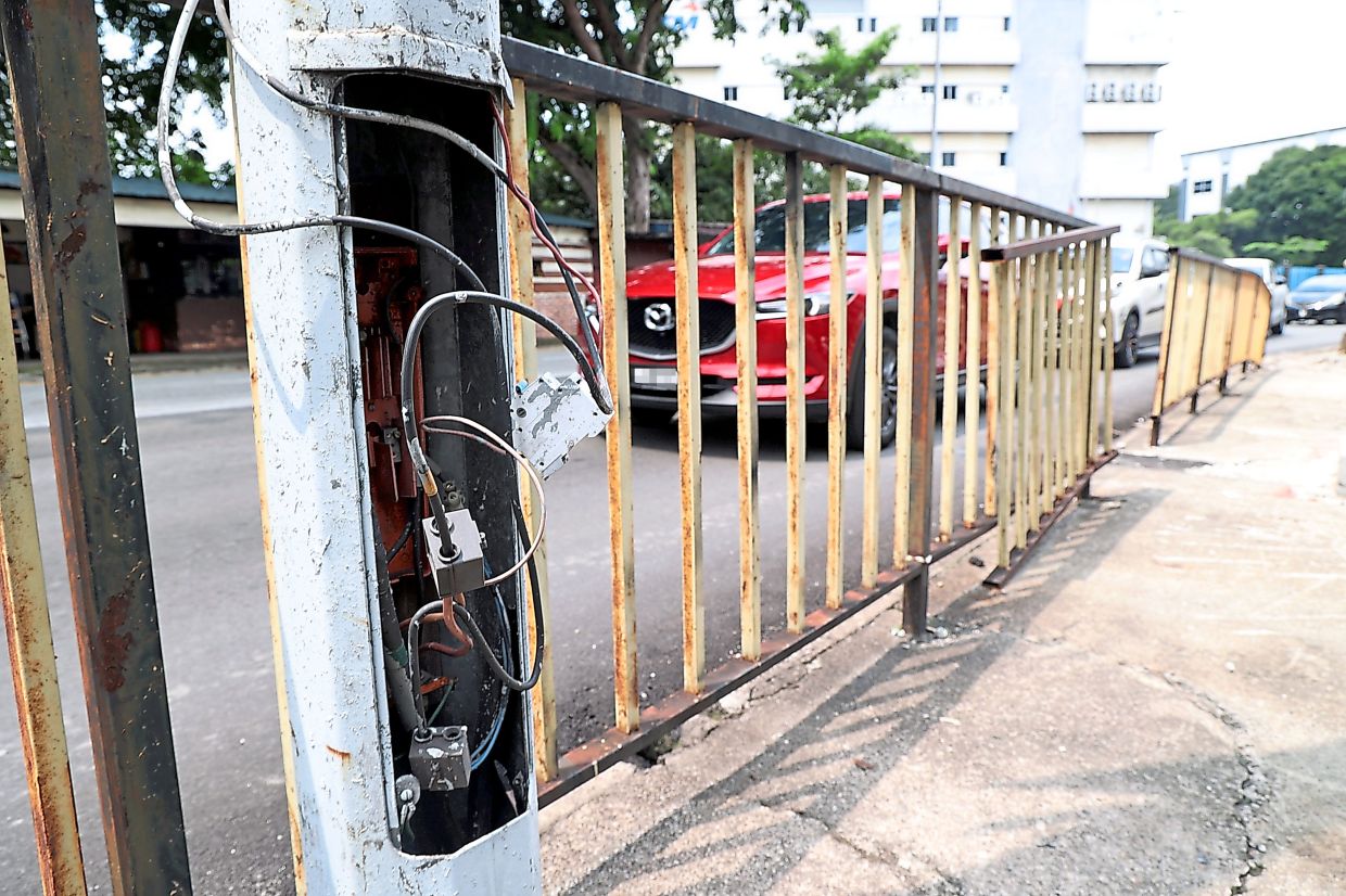 This lamp post appears to have been vandalised.