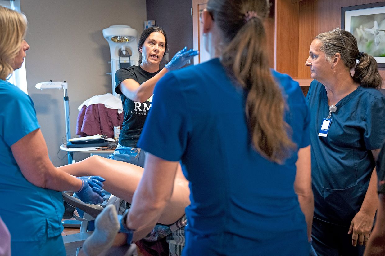 Dr Bergeson (second from left) demonstrates some birthing scenarios with the high fidelity birth simulator ‘Virginia’ during the recent training session with nurses at Riverwood Healthcare.