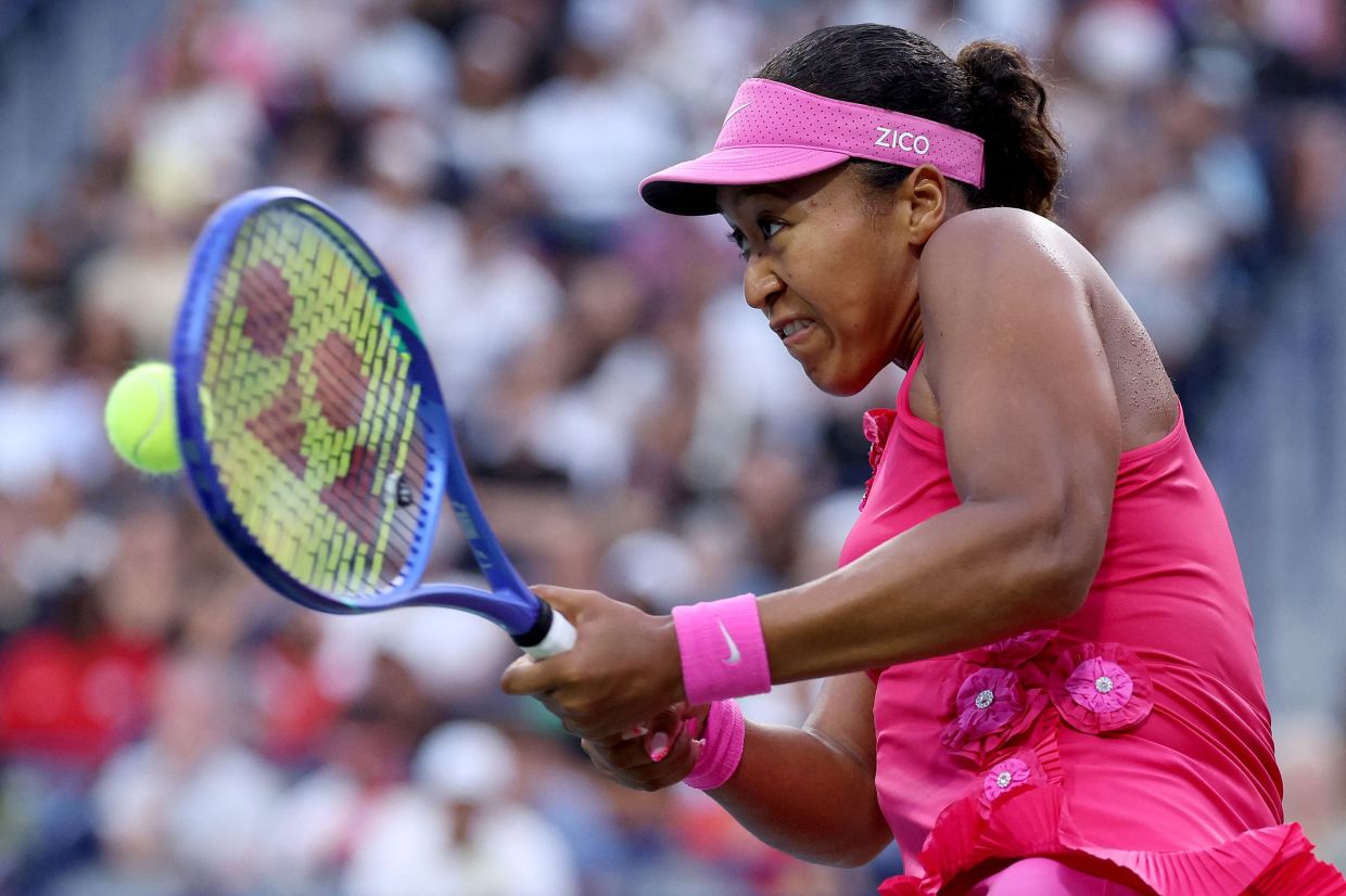 Naomi Osaka of Japan returns a shot to Leylah Fernandez of Canada during day eight of the National Bank Open Presented by Rogers at Sobeys Stadium in Toronto, Ontario. -- Photo: Matthew Stockman/Getty Images/AFP