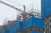 Beijing eases housing rules to revive property market