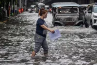 Philippine police mobilise rescue units amid floods as hundreds of thousands of people affected by heavy weather