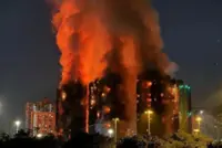 Hong Kong residential complex fire likely sparked by lit cigarette ends: report