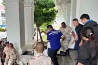 Gunman fires inside Thai government office as country reels from school shooting; officers injured in incident