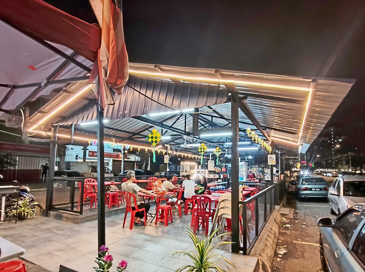 Stalls at one of four pavement islands along Jalan Palong in Taman Miharja which will be demolished and upgraded.