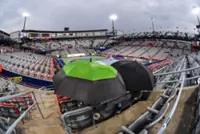 Tennis-Rain in Montreal forces Canadian Open to reschedule men's quarter-finals