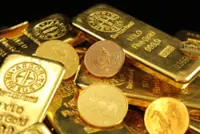 Gold eases from over two-month peak, inflation reports in focus