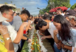 10,000 pieces of longganisa or spicy sausages served at boodle fight in Philippine town