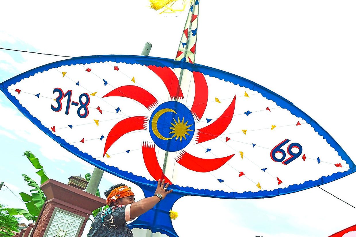 Mohd Norazizi with another of his kites, measuring up to 3.6m, for the competition.