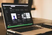 Spotify asks artists to disclose whether they’re humans or AI