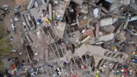 Colombia president vows reconstruction fund as search for quake survivors enters critical period
