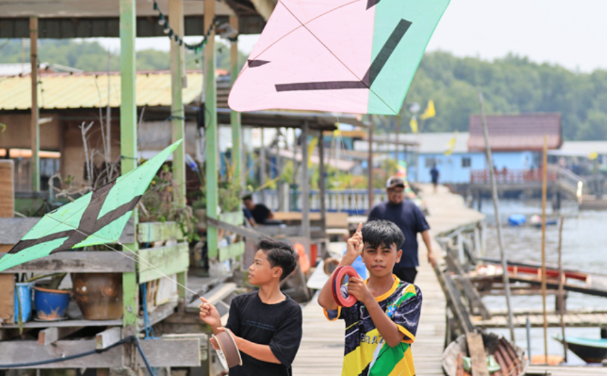 The photographers also captured children flying kites and engaging in traditional indoor games. - CONTRIBUTOR