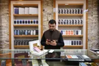 Afghan students divided over smartphone ban at universities