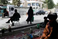 Half of Afghan women rarely leave home as Taliban restrictions deepen, UN agency says