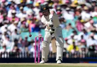 Cricket-Barnstorming Bangladesh humble Australia on day one of Darwin test