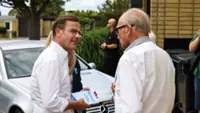 Sweden's right-wing government lags in poll, but gap narrows