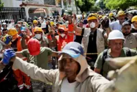 Hundreds still missing in Colombia as desperation grips earthquake rescue effort