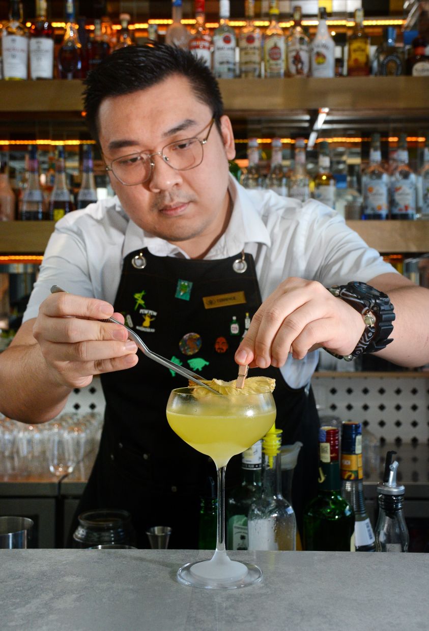 Ho serving up the Andaman, which pays tribute to the hotel’s coastal setting.