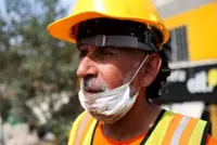 Veteran volunteer digs for survivors after Colombia quake