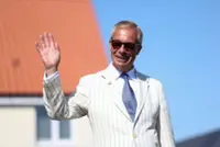 Nigel Farage regains UK parliamentary seat, fights off Count Binface challenge