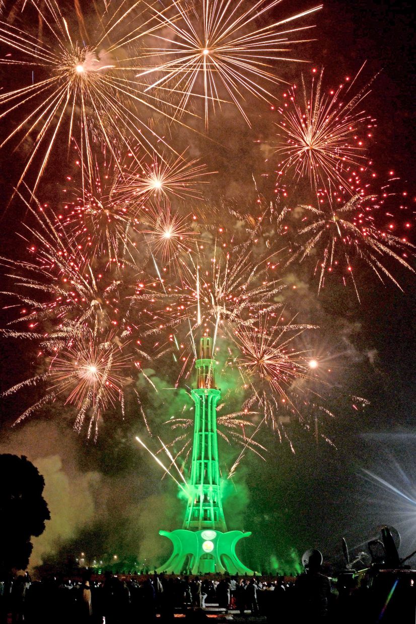 Burst of excitement: Fireworks exploding in the sky to celebrate the country’s Independence Day, in Karachi. — Reuters
