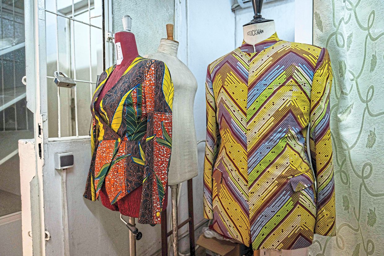 The abacost, a closed-front jacket, on display at the Okasol workshop in Kinshasa. — AFP