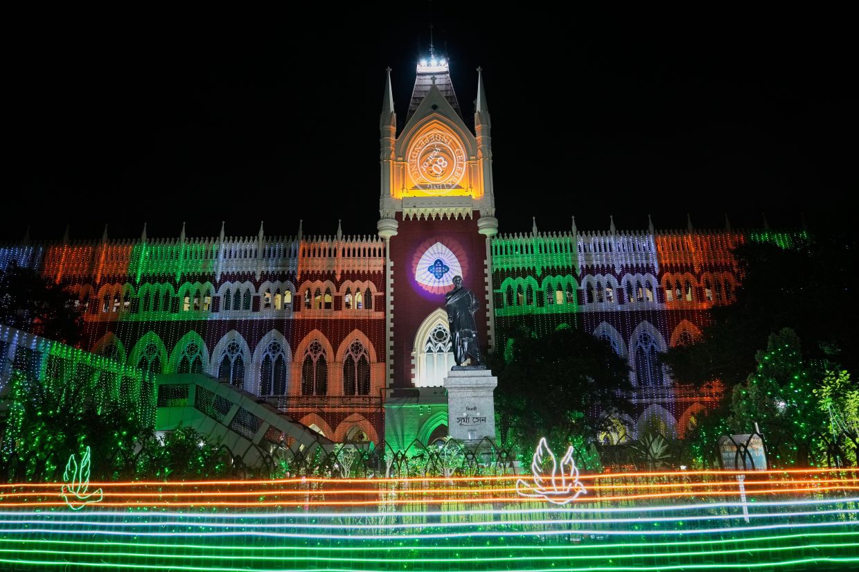 High Court of West Bengal state is illuminated in the colors of the Indian national flag ahead of Independence Day, which will be celebrated on Aug 15, in Kolkata, India, Friday, Aug 14, 2026. - Photo: AP