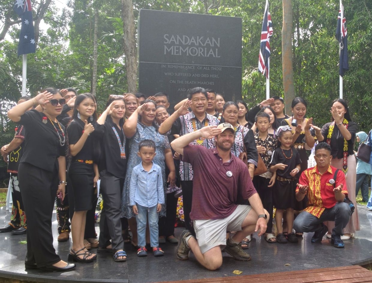 Sergeant Major Korom Anduat’s family at the Sandakan Memorial Park.