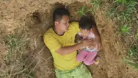 Chinese dad sparks controversy after digging grave to help sick daughter cope with death
