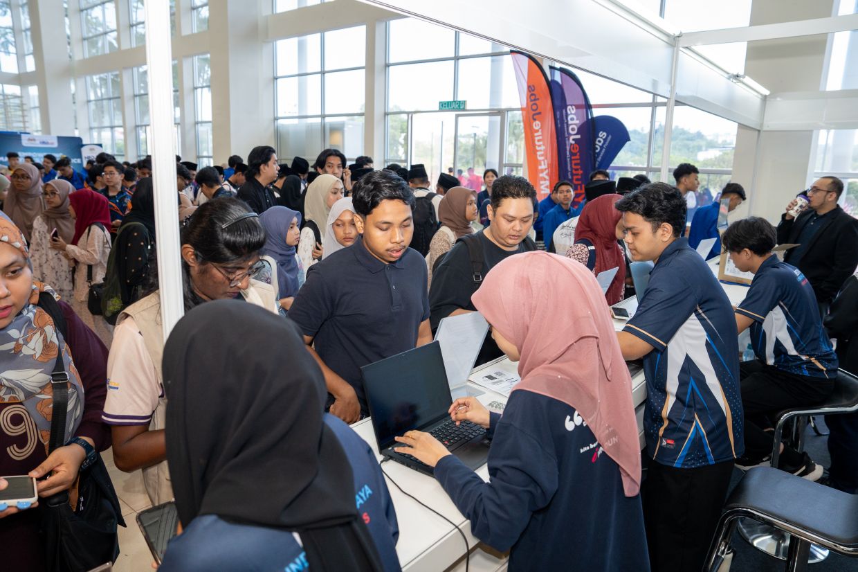 Jobseekers at the carnival, excited to meet prospective employers and explore available vacancies.