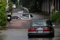 Japan’s Chiba prefecture deals with removing abandoned cars after record rainfall