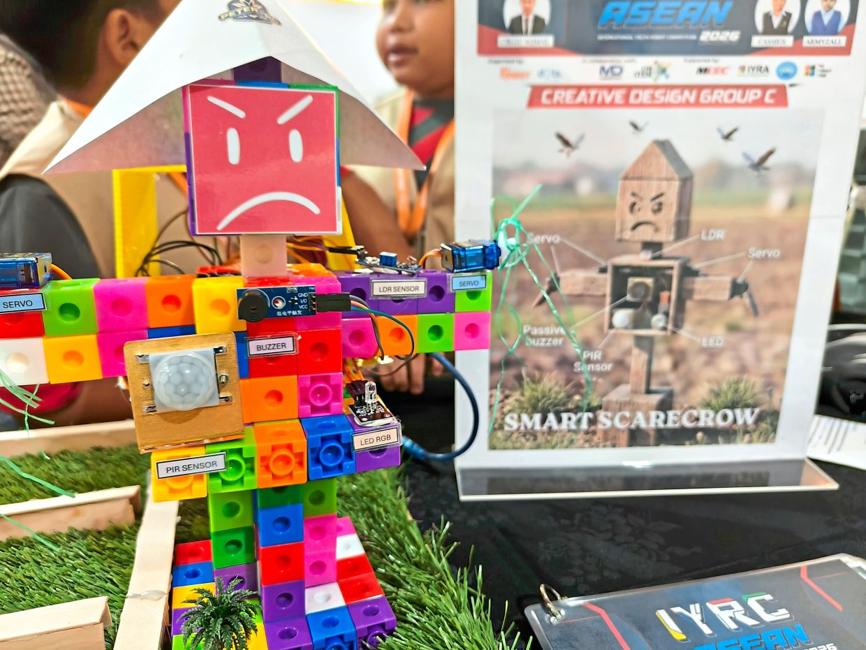 The Smart Scarecrow robot presented by students from Sekolah Kebangsaan Pengkalan Tereh at IYRC. — ANGELIN YEOH/The Star